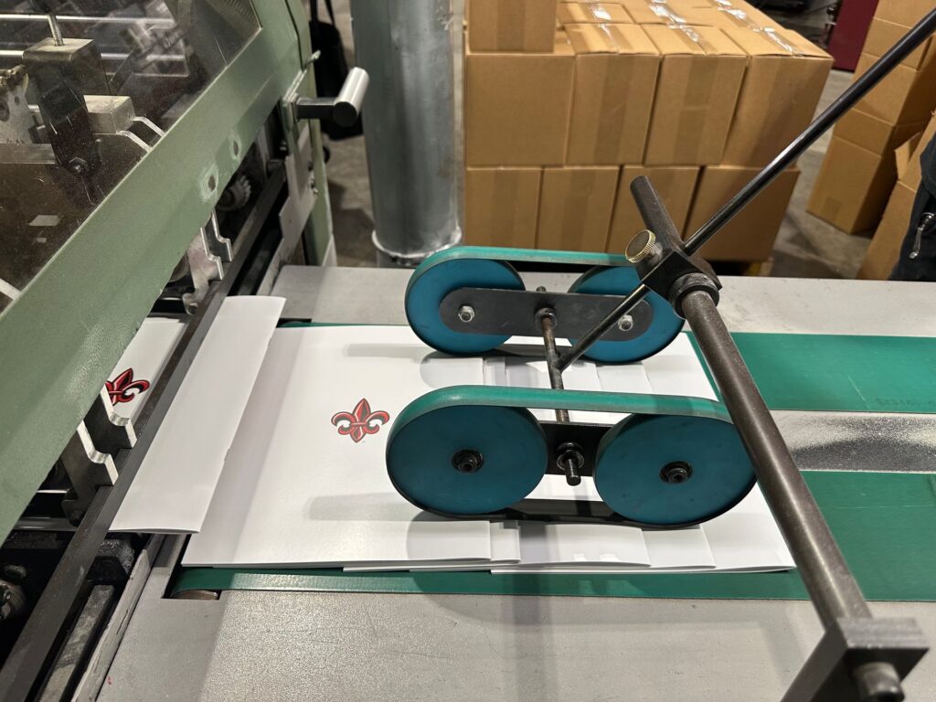 Bindery equipment running a print job