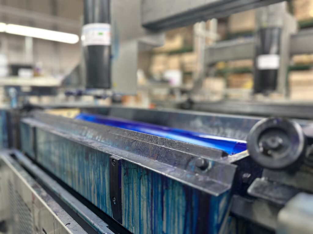 Offset press ink rollers in motion
